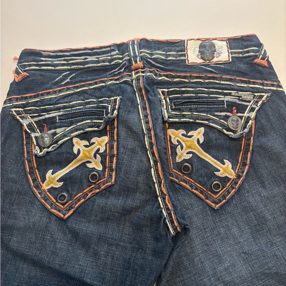 Rare laguna beach cross dagger jeans ( rips were made like that)
